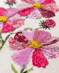 Meet the Cosmos kit! These vivid pink, daisy-like flowers have been known to symbolize balance and harmony for their crisp, even petals, but also ‘joy in love and life’ in the Victorian era! Flowering in gardens across the world for many months of the year, these striking blooms attract bees, butterflies and birds to the garden. A combination of Liberty London fabrics, vintage patterned pink/white fabrics are combined with plenty of specialty pieces to add texture and detail to your piece, like hand dyed sari silk, cheese cloth and vintage lace. The kit includes a lush, creamy linen coloured background to work on and all the threads and fabrics needed to complete these bright, cheery flowers. You supply sharp scissors, a marking pen, and a glue stick or fabric glue. Each Wattle&Loop Slow-S