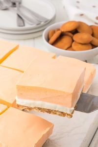 Removing a Creamsicle Bar from the pan.