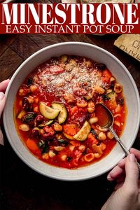 Instant Pot Minestrone Soup cooks in just 5 minutes! Loaded with veggies, beans, and delicious pasta, then topped with lots of nutty parmesan cheese and fresh parsley. Serve it with crostini for dipping into that delicious broth. // easy // recipe // vegetarian // healthy // italian