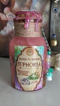 Glass corked bottle potion that is great for sensory item or witchy decor! Sight sensory with beautiful dreamy cloud look.