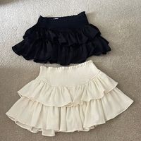 Each Skirt Has Never Been Worn And Has No Rips Or Stains. Each Skirt Has An Elastic Band With Built In Shorts. They Both Are Super Comfortable And Can Be Worn With Anything And Both Are Cute Flowy Skirts.