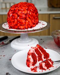 This brain cake is perfect for Halloween! It's made with moist red velvet cake layers, pink buttercream and raspberry jam blood.