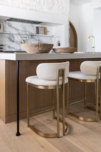 Inspired by mid-century details with a hint of Art Deco, our Donley Stool is upholstered in cotton Dhurrie fabric and supported by antique brass plated legs. A sophisticated and comfortable addition to any dining space. Bar Stool Dimensions: 18.5" W x 20.5" D x 39.25" H | Seat Height: 30"Counter Stool Dimensions: 18.75" W x 19.75" D x 33.25" H | Seat Height: 24"Materials: Steel, CottonFinish: Antique Brass All items subject to availability and should not be assumed as in stock Contact our custom