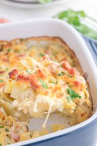 This Cheesy Ham and Potato Casserole recipe is the perfect comfort food and is great for brunch or dinner. Easy to make and packed with flavor, it's a delicious and hearty meal. Plus, it's a great way to use up leftover ham, and can be made ahead of time.