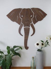 Customise your living space your way, with our tactile wooden wall art animal heads. Made from sustainable Walnut wood grain, our elegant Elephant / Lion / Stag Head wall art pieces are sanded and finished by hand with a protective wax. Our wall art is supplied with adhesive fixings, ready to hang