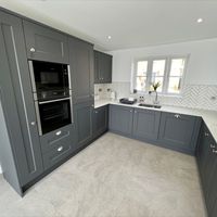 A perfect combination of light and dark colours in this new kitchen we recently fitted.

- 20mm Calacatta quartz worktops
- Caraway style doors
- Full light grey floor tiles with matching sills
- Stunning microcline white wall tiles in a herringbone pattern
- Designer anthracite radiators
- NEFF appliances
- Under cabinet LED lighting

🌟🌟🌟🌟🌟 Rated on TrustATrader -  https://bit.ly/3jfLrZw

From amazing makeovers, to brand new kitchens, our team take care of it all.

01782 606565