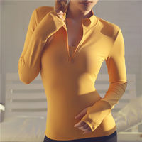 Elevate your workout with our 1/4 Zip Long Sleeve Yoga Top. Designed for comfort and performance, this top features a breathable, quick-dry fabric with thumb holes and a sleek 1/4 zip for adjustable ventilation. Perfect for yoga, gym sessions, or casual wear, it offers both style and functionality.