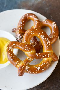 Cooking your Frozen Pretzel in an Air Fryer achieves that chewy outside and soft inside. Air Fryer Soft Pretzels are the perfect snack ready in just 5 minutes! #airfryerrecipes #airfryersnacks #softpretzels