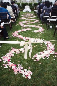 prettttty  love the ribbon to keep guests from walking down the center so the bride & her father do the honors