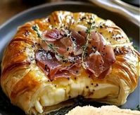 Baked Brie in Puff Pastry with Honey, Fig, and Prosciutto