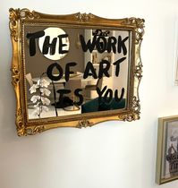 The purpose of this art Is to remind ourselves that we truly are a work of art.  Self love is the foundation of manifestation and one of the most important things to do in life.  The words "The work of art is you " is written in black paint on this vintage looking mirror. It measures 16.5" x 13.5" Comes with 3" x 2" card to hang on your wall that states: "Self-love is the foundation upon which the entire process of manifesting rests.  Looking at the reflection in the mirror is a gentle reminder