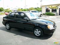 2000 Ebony Black Hyundai Accent L Coupe #25920547 Photo #3 | GTCarLot.com - Car Color Galleries