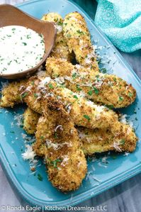 This easy Chicken Tender recipe is low in fat and calories. Don’t let that fool you, they are packed with flavor! Ready in just 12-minutes, this is one meal your entire family will love! #Kitchen Dreaming #Air fryer recipes healthy #air fryer recipes chicken #Air fryer chicken #air fryer chicken tenders #Air fryer chicken tenders #Air fryer chicken tenders panko #air fryer chicken tenders Parmesan