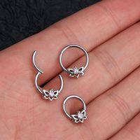 Flower with CZ gem decoration gives the septum ring a special look. The hoop ring barbell is made of 316L stainless steel, nickel-free, lead-free, and hypoallergenic, which can be used for a long time High polished smooth surface, comfortable to wear without sharp edge, and no irritation to your skin. Can be used as a septum ring, helix earring, conch earring, and rook earrings. Size: Bar Thickness: 16G=1.2mm Inner Diameter: 8mm,10mm We strive to bring you the best quality body jewelry for the b