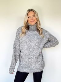 Experience absolute comfort and elevated style with the Times Square Sweater. Crafted from a luxuriously soft and stretchy knit fabric, this basic yet essential turtleneck offers a relaxed fit perfect for layering. Whether you are lounging at home, attending a brunch date, or shopping downtown, the chic Times Square Sweater will take your look to the next level. 43% Acrylic 36% Polyester 19% Nylon 2% Wool Hand wash cold.