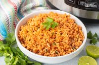 Say goodbye to mushy rice! Learn how to make perfectly fluffy Mexican Rice in the Instant Pot with this quick and easy recipe.