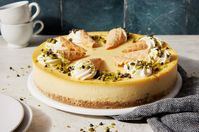 Cannoli Cheesecake Recipe | King Arthur Baking: Our cannoli cheesecake combines two desserts into one delectable mash-up. Waffle cones serve as the crust and the garnish for the cheesecake, while ricotta and cream cheese make a velvety filling. Bake one for your next special occasion!