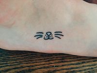 Tiny Foot Tattoo