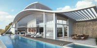 Luxury International Interior Architecture and Design project by Katharine Pooley. Curved architecture and a cool blue swimming pool.