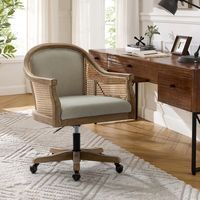 This home office desk chair brings an eye-catching spare seat to your offce. The shapely frame is crafted of substantial hardwood with airy caned barrel back for wrap-around support. It adopts rattan weaving design, full of farmhouse pastoral style. The polyester cushion provides greater sitting width, and keeps your hip away from stuffy heat and discomfort. It features a swivel base and wheels, so you can turn in and out of conversations with ease. It has a backrest that helps maintain the natu