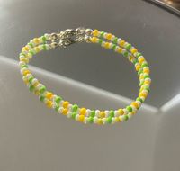 Green, yellow and white bracelet. 🍋💚 Message for any questions!