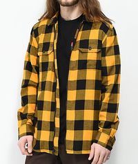 With almost a century of experience between them, Vans and Independent have teamed up to offer the best in skate styling and functionality. This collaborative yellow and black full zip flannel shirt has a classic silhouette with modern detailing for a fresh look. Finished with a collaborative brand patch for signature style, this lightweight flannel top features a black and yellow plaid pattern throughout for an original design that is great for layering or wearing on its own.