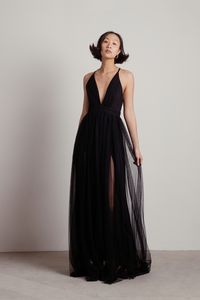 "Ever Wanted To Achieve The Femme Fatale Aesthetic? Wear The Here To Slay Black Plunging Maxi Dress And Enter Any Evening Party Looking Like A Goddess Of Mischief. The Number’S Flowy Sheer Bottom, Pleated Halter Top, And Plunging V Neckline Speak To The Sexy Troublemaker That You Are. And If This Isn’T Mysterious Enough, The Thigh-High Slit Of This Dress’ Inner Lining Will Surely Captivate Anyone Who Comes Your Way. Team It With Black Heels And Statement Jewelry For An Exquisite Ensemble."