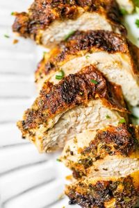 Air fried bone-in, skin-on chicken breast brined in buttermilk and seasoned with a mix of herbs and spices makes for perfectly juicy chicken. #airfryerchicken #airfryerchickenbreast