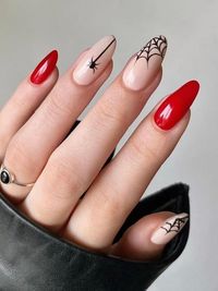 red nails with spider webs