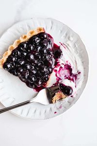 This No Bake Blueberry Pie is a delicious dessert that requires no oven time. With an easy press-in crust and simple ingredients, this blueberry stunner is bursting with flavor. Gluten-free and vegan.