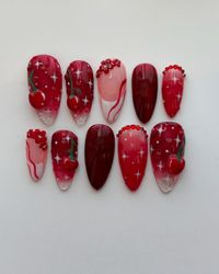 Handmade Gel Press-ons, made to order!  -Gel Polish -Red Flower Charms,  Red Rhinestones, Hand Molded Cherries  Sizes range from (1 to 11) ( Ask for ) thumb (0-3) Ex: 0 pointer (4-7) Ex: 5 middle (3-6) Ex: 4 ring (4-7) Ex: 5 pinky (7-10) Ex: 8 Includes: Set of 10 nails Nail Glue Sticky Tabs Alcohol Wipes