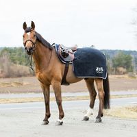 Ride in comfort and style all winter long with the lovely B Vertigo Concord Wool and Acrylic Exercise Blanket. A bold, silver-threaded logo emblazons the rear quarter for elegant style. The unique 3-layer fabric of this impeccable exercise blanket is bonded to one layer and weaved together to create air pockets for warmth. This thermal, breathable blanket keeps the horse warm during exercise while allowing moisture to escape. Padding: 1% Polyester. Size: 81-84.  Color: Blue.