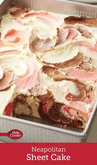 Marble cake gets an upgrade with this sweet sheet cake swirled with Neapolitan flavors. Frosting swirls of chocolate, vanilla and strawberry make this pretty cake stunning from top to bottom!