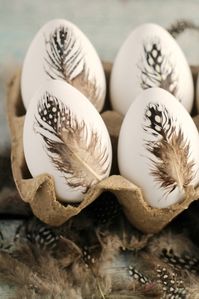 These DIY Feather Easter Eggs are a simple but elegant way to decorate Easter eggs!