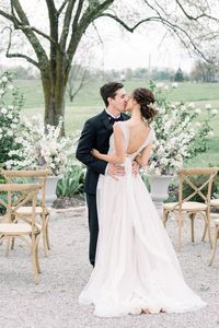 Spring Missouri White Barn Wedding | MO Weddings | Whimsical Spring Garden Wedding at Blue Bell Farm in Missouri. Get inspiration from this Bridgerton inspired lavender wedding ceremony and reception designed by Allyssa Elaine Events and captured by Midwest based wedding photographer and videographer team, Bri Whitman Photo & Films.