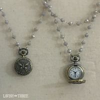 Beautiful vintage inspired butterfly timepiece charm on a long 34.5" elegant grey beaded necklace. This gorgeous necklace is the perfect gift for Mothers day,   Valentines day, Christmas or anniversary. This is sure to be treasured by whoever receives it!