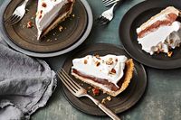 Possum pie, popular in Arkansas, is absolutely meat free. Possums are notorious for playing tricks—and that’s exactly what this pie’s cream cheese and chocolate layers do by hiding underneath a pile of fluffy whipped cream.