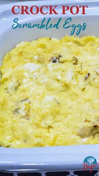 Want a make-ahead scrambled egg recipe that can feed a crowd? Make fluffy crock pot scrambled eggs the night before and have the best scrambled eggs in just two hours. The secret ingredients in these eggs will make people wonder why crock pit scrambled eggs are so much better than regular scrambled eggs. #crockpotbreakfast #crockpot