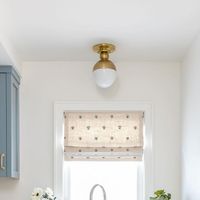 Alicia Torosian Design on Instagram: "Who said laundry couldn’t be cute? This adorable blue laundry room with its stunning tile floors will have you excited to do the wash!   Photography:  @ryangarvin   Laundry room, Tile floors, custom cabinetry  #laundryroom #tilefloors #bedrosianstile #bluecabinets #bluelaundryroom #floraltile #customwindowtreatments #aliciatorosiandesign #atdxportstreets1 #newportbeachca #housebeautiful #ruedaily #hgtvdreamhome #hgtvmagazine"