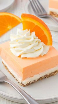 These Orange Creamsicle Dream Bars are the perfect no-bake dessert for summer! Your whole family will love the crunchy crust, sweet cheesecake layer, and refreshing orange cream topping. One taste of this sweet summer dessert, and you’ll go right back to the days of buying an Orange Creamsicle off the ice cream truck.