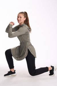 This buttery-soft sports jacket will change your life. It's designed to be a daily staple, easy to throw on for the gym, errands or a day at the beach. Layer it over a tank for a quick and stylish modest workout look, or wear over your one-piece suit to create modest swimwear in seconds. Here are just a few of the features that make this jacket a must-have: Deep hood for maximum head coverage Side petal-like slits that open when you do leg movements, and close to keep maximum modesty when you st