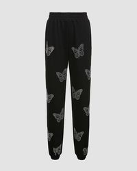 Model (WearingS):Height: 176cm | Bust: 85cm | Waist: 60cm | Hip: 95cmDetails:K-Pop-inspired Matching Diamante Butterfly PantsPant Length:LongMaterials:90% Cotton + 10% Polyester