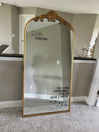 "Vinyl Decal for Mirror or Acrylic Signage.  Mirror pictured is 3' wide x 6' tall & is shown with sizing option 1 for the decal (see below): Removable vinyl (permanent available by request) Can choose white or black vinyl  The decal will come in 3 pieces: 1) Hello Friends 2) You look incredible, now go grab a drink 3) xo, names. A sheet of transfer tape that fits the largest decal piece will be provided. Transfer tape is reusable. Sizing options: Option 1: \"Hello Friends\" 11.8\" wide x 5.7\" tall & bottom decals combined 14-17\" wide (depending on name length) x 16.2\" tall Option 2: \"Hello Friends\" 9.6\" wide by 4.7\" tall & bottom decals combined 11-14\" wide x 13.2\" tall Option 3: \"Hello Friends\" 7.7\" wide by 3.7\" tall & bottom decals combined 9-11\" wide x 10.6\" tall For help