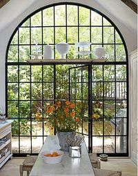 It might be my Southern California years, but I've always loved steel windows. They won't work if you're not in a warm climate, though.