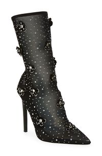 Sparkling crystals and floral appliqués dot the mesh overlay of an alluring pointy-toe bootie lifted by a stiletto heel. Synthetic and textile upper/synthetic lining and sole Imported Asian Owned/Founded