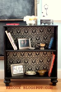 Add feet and wallpaper to a cheap bookcase.