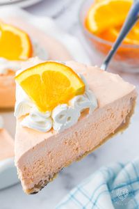 An Orange Jello Creamsicle Pie is an orange popsicle with an irresistible creaminess, all in a cookie pie crust. It screams hot summer days and ice cream trucks! 