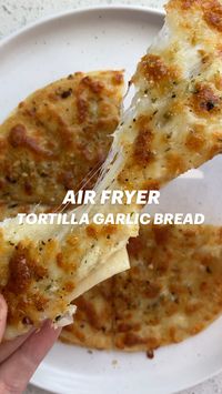 This air fryer tortilla garlic bread is such a simple recipe that’s been floating all around social media. With a simple butter and garlic spread and a quick air frying process, you’ll enjoy a delicious snack or side that’s easy to make and impossible to resist.