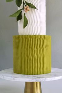 Gorgeous chartreuse green wedding cake with textured fondant created using Crummb's signature rolling pin