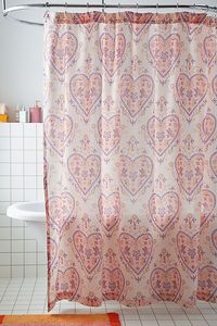 Show your bathroom some love with this cotton shower curtain that brings vintage charm into your space. Our Sadie Trinket Shower Curtain features romantic femme icons printed allover. This cotton shower curtain is topped with perforations along the upper edge for easy setup. Available exclusively at Urban Outfitters. Features Sadie Trinket shower curtain from UO Home Cotton shower curtain with femme trinket icons printed allover Ready for hanging with perforations along the top edge Recommended for use with shower liner An eco-friendly upgrade, this item is OEKO-TEX® Standard 100 certified free of harsh chemicals UO exclusive Content + Care Shower curtain hooks and liner sold separately 100% Cotton OEKO-TEX® Standard 100 Certified Meets OEKO-TEX® Standard 100 guidelines which independently